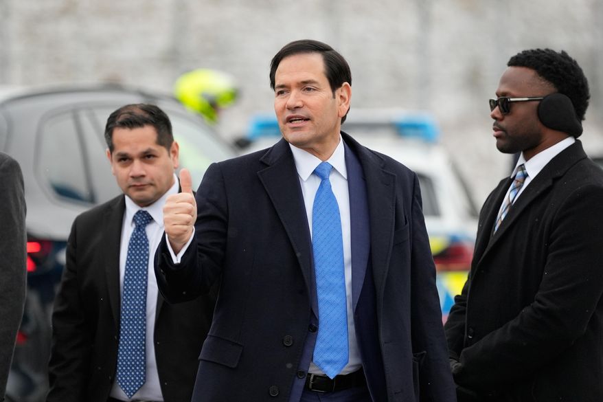 U.S. Secretary of State Marco Rubio gives a thumbs up as he departs Munich International Airport in Munich, Germany, Sunday, Feb. 15, 2026, after attending the Munich Security Conference. (AP Photo/Alex Brandon, Pool)