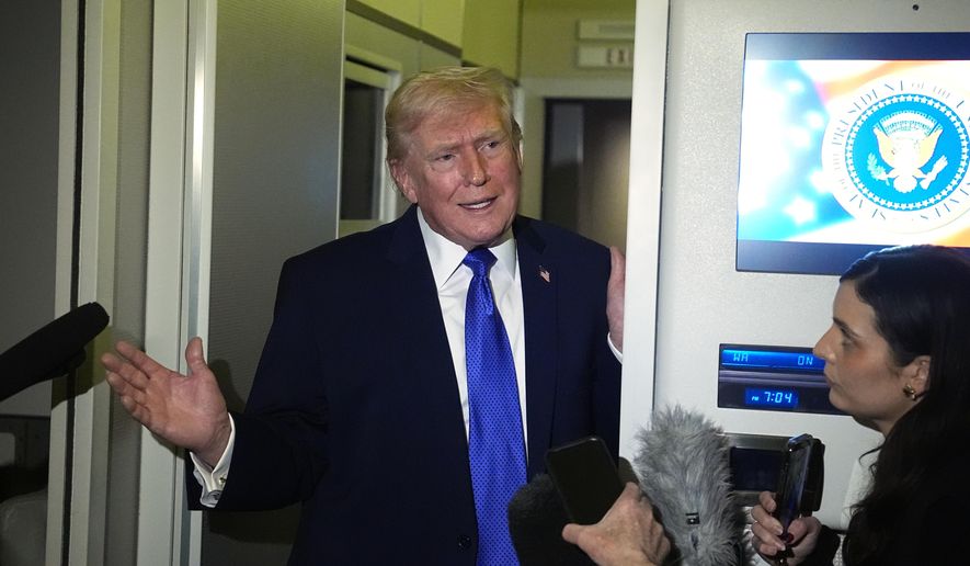 President Donald Trump speaks with reporters aboard Air Force One, Monday, Feb. 16, 2026, en route to Washington from West Palm Beach, Fla. (AP Photo/Matt Rourke)
