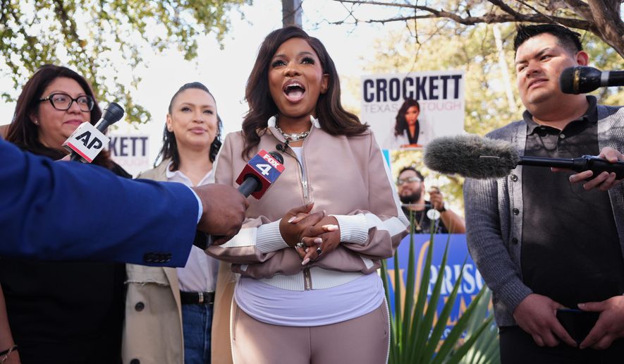 Primary candidate for U.S. Senate Rep. Jasmine Crockett, D-Texas, speaks to reporters and supporters before voting early in the primary election, in Dallas, Tuesday, Feb. 17, 2026. (AP Photo/LM Otero)