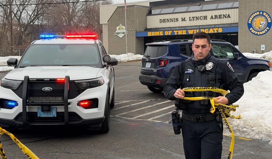 Police continue to tape off the Dennis M. Lynch arena a day after a deadly shooting during a youth hockey game on Tuesday, Feb. 17, 2026 in Pawtucket, R.I. (AP Photo/Rodrique Ngowi)