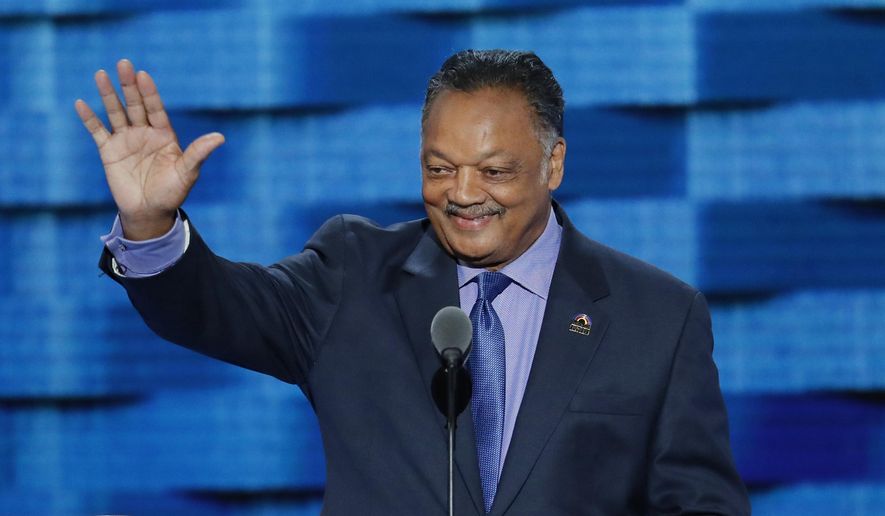 The Rev. Jesse Jackson waves as he steps to the podium during the third day of the Democratic National Convention in Philadelphia, July 27, 2016. (AP Photo/J. Scott Applewhite) ** FILE **