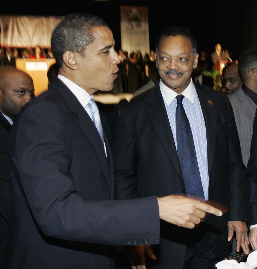 Democratic presidential hopeful Sen. Barack Obama, D-Ill., left, and the Rev. Jesse Jackson are seen at the Rev. Dr. Martin Luther King Jr. Scholarship Awards Breakfast in Chicago on Jan. 15, 2007. (AP Photo/Charles Rex Arbogast, File)