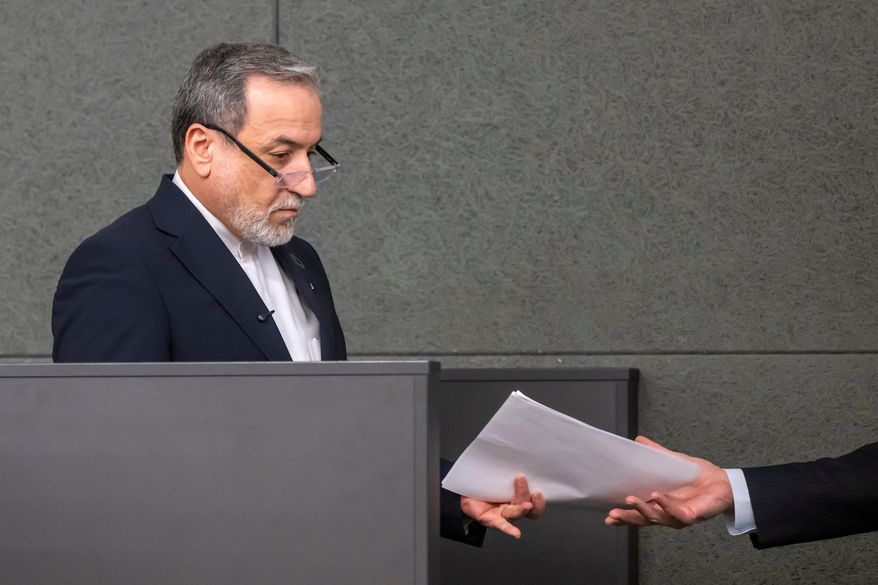 Iranian Foreign Minister Abbas Araghchi, leaves during the Conference on Disarmament, at the European headquarters of the United Nations in Geneva, Switzerland, Tuesday, Feb. 17, 2026. (Martial Trezzini/Keystone via AP)