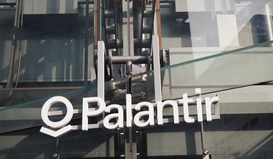 Palantir signage hangs on an office building in Tokyo's Shibuya Ward in Japan. The building is known as 'The Iceberg'. The global data-mining giant said Tuesday that it will relocate its headquarters from Denver to Miami, joining the wave of tech firms fleeing blue states for South Florida’s friendlier business habitat. (File Photo credit: Ned Snowman via Shutterstock)