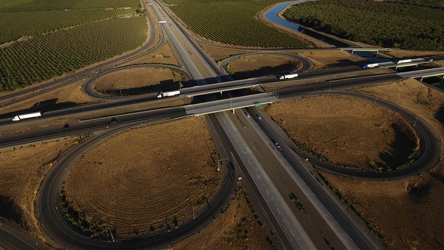 Freight trucks travel northbound on Interstate 5 Highway, Sept. 3, 2025, in Tracy, Calif. (AP Photo/Godofredo A. Vásquez, File)