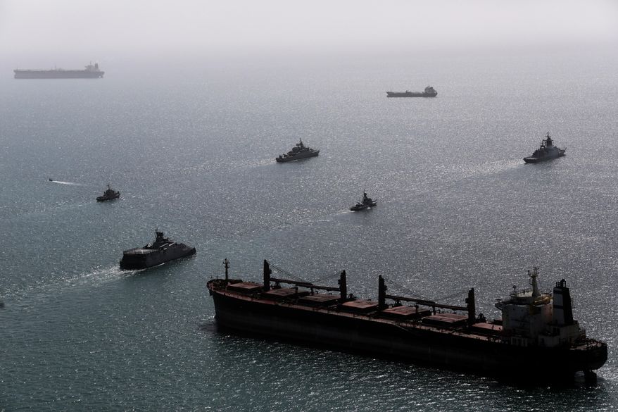 This image provided Thursday Feb. 19, 2026 by the Iranian military and dated Tuesday, Feb. 17, 2025, shows navy ships conducting operations during a join drill by Iranian and Russian forces in the Indian Ocean.(Masoud Nazari Mehrabi/Iranian Army via AP)