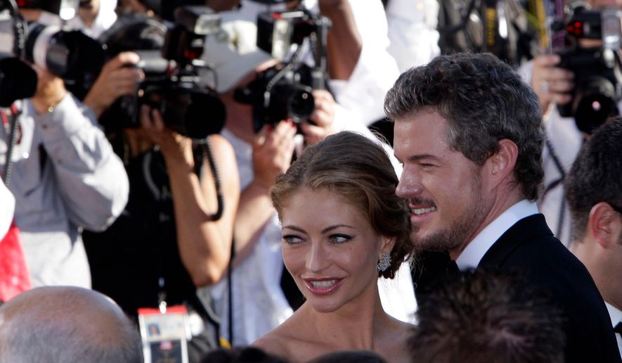 Eric Dane and Rebecca Gayheart arrive at the 59th Primetime Emmy Awards at the Shrine Auditorium, Sept. 16, 2007, in Los Angeles. (AP Photo/Kevork Djansezian, File)