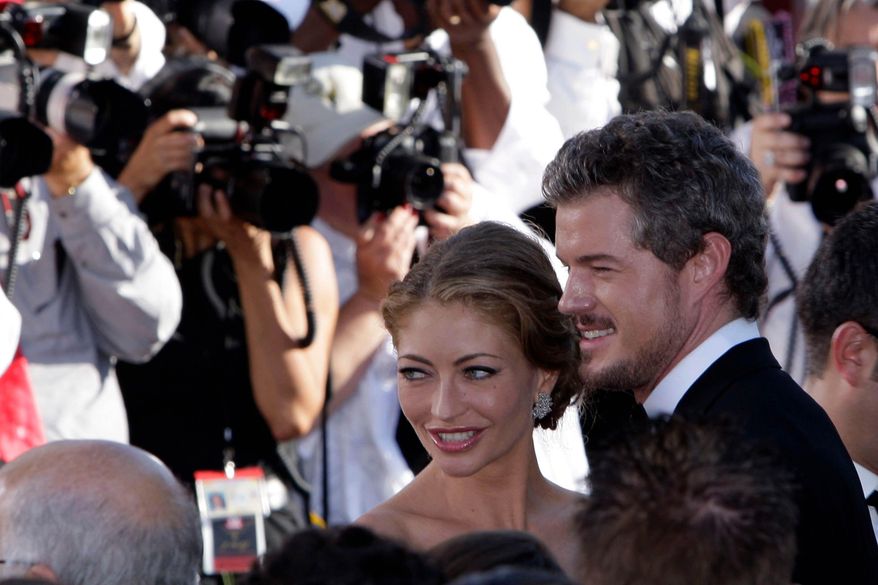 Eric Dane and Rebecca Gayheart arrive at the 59th Primetime Emmy Awards at the Shrine Auditorium, Sept. 16, 2007, in Los Angeles. (AP Photo/Kevork Djansezian, File)