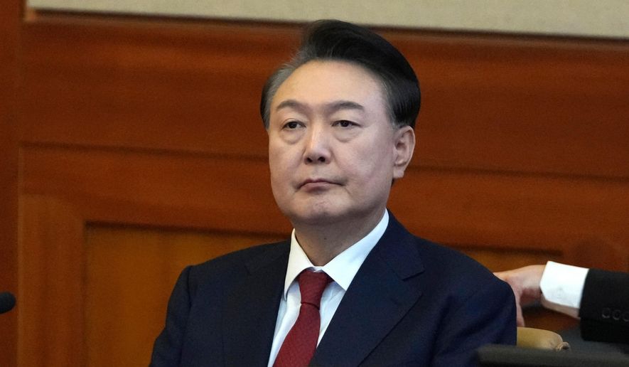 South Korea's impeached President Yoon Suk Yeol attends a hearing of his impeachment trial at the Constitutional Court in Seoul, South Korea, on Feb. 11, 2025. (AP Photo/Lee Jin-man, Pool) **FILE**