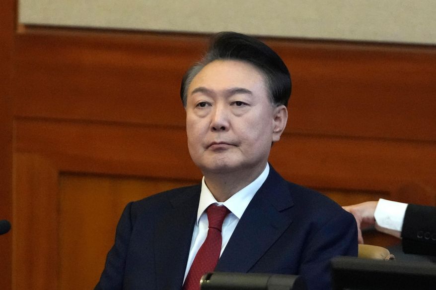 South Korea's impeached President Yoon Suk Yeol attends a hearing of his impeachment trial at the Constitutional Court in Seoul, South Korea, on Feb. 11, 2025. (AP Photo/Lee Jin-man, Pool) **FILE**