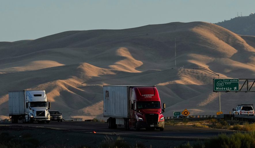 Freight trucks travel northbound on Interstate 5 Highway, Wednesday, Sept. 3, 2025, in Tracy, Calif. (AP Photo/Godofredo A. Vásquez, File)