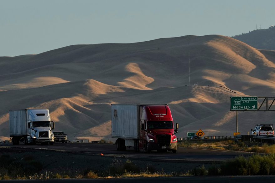Freight trucks travel northbound on Interstate 5 Highway, Wednesday, Sept. 3, 2025, in Tracy, Calif. (AP Photo/Godofredo A. Vásquez, File)