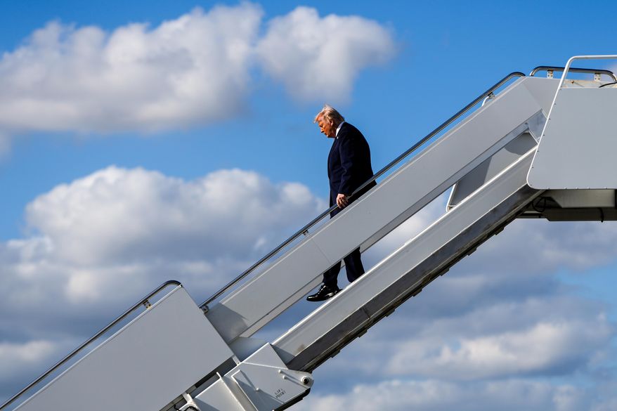 President Donald Trump disembarks Air Force One at Palm Beach International Airport, Jan. 16, 2026, in West Palm Beach, Fla. (AP Photo/Julia Demaree Nikhinson, File)