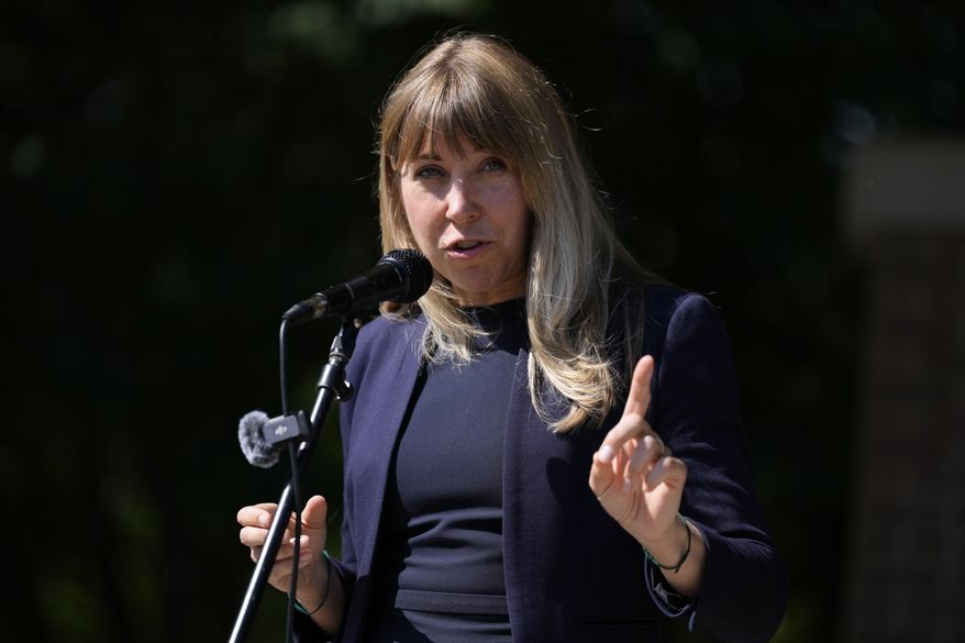 Iowa congressional candidate Sarah Trone Garriott speaks during an Iowa Democratic Party rally in Windsor Heights, Iowa, on Thursday, July 3, 2025. (AP Photo/Charlie Neibergall) **FILE**