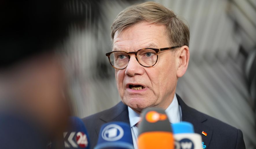 German Foreign Minister Johann Wadephul speaks with the media as he arrives for a meeting of EU foreign ministers at the European Council building in Brussels, Monday, Feb. 23, 2026. (AP Photo/Virginia Mayo) ** FILE **