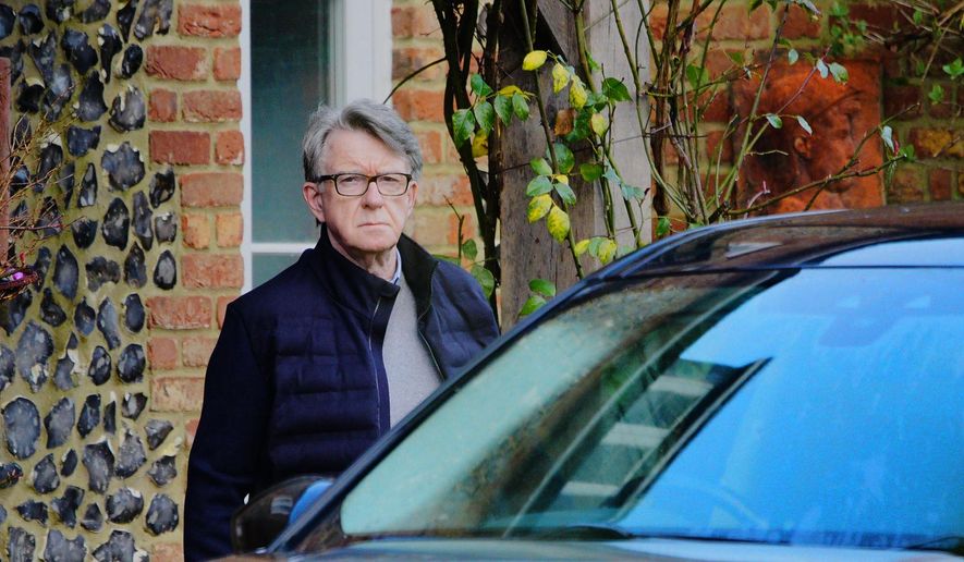 FILE - Peter Mandelson leaves his home in Wiltshire, England, Feb. 20, 2026. (Ben Birchall/PA via AP, File)