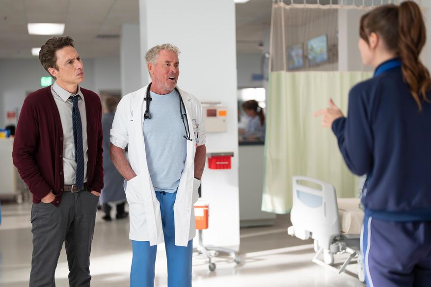 This image released by Disney shows, from left, Zach Braff, and John C. McGinley in a scene from "Scrubs." (Darko Sikman/Disney via AP)