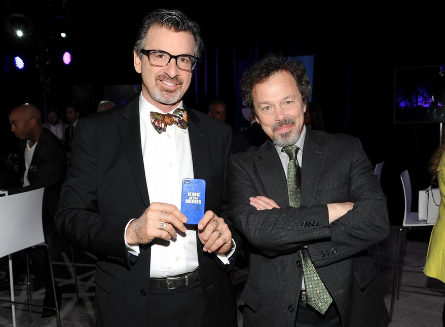 Robert Carradine, left, and Curtis Armstrong, co-hosts of the game show "King of the Nerds" appear at the TNT and TBS 2013 Upfront in New York on May 15, 2013. (Photo by Evan Agostini/Invision/AP, File)