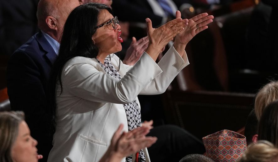 Rep. Rashida Tlaib, D-Mich., gestures as President Donald Trump delivers the State of the Union address to a joint session of Congress in the House chamber at the U.S. Capitol in Washington, Tuesday, Feb. 24, 2026. (AP Photo/Matt Rourke)