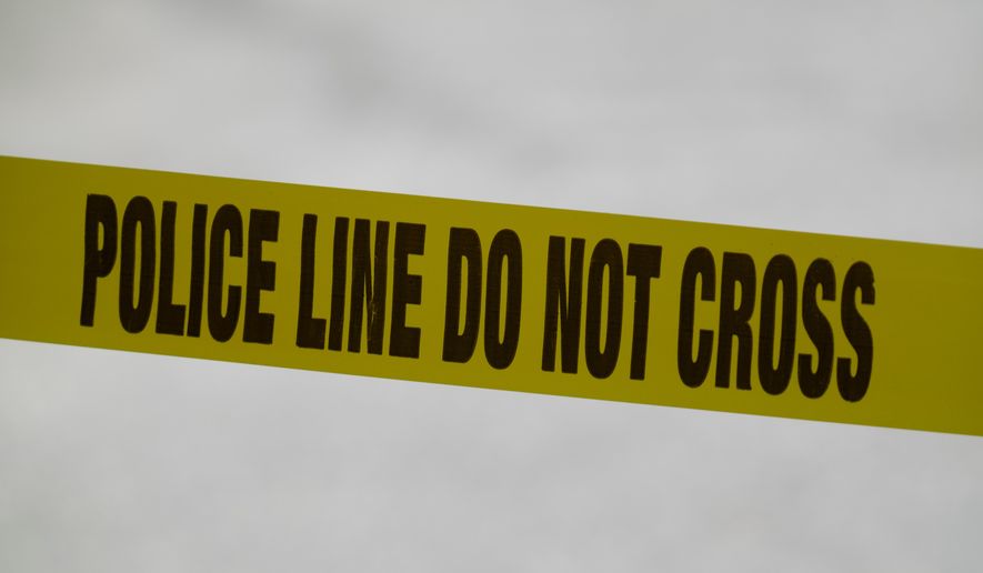 Police tape is used in Chester, Pa., Wednesday, May 22, 2024. (AP Photo/Matt Rourke, File)