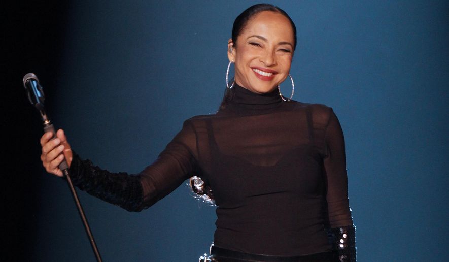British singer Sade Adu performs during her "Soldiers of Love" concert in Sao Paulo, Brazil, on Oct. 20, 2011. (AP Photo/Andre Penner, File)