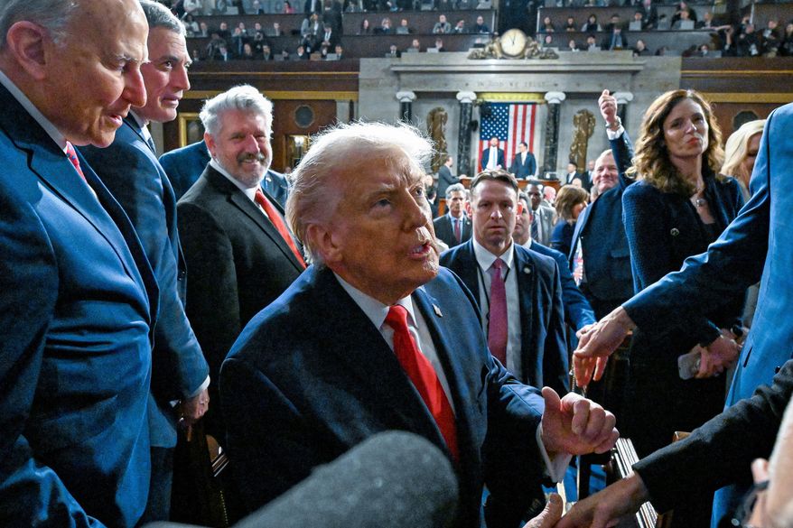 President Donald Trump exits the House Chamber after delivering the State of the Union address to a joint session of Congress in the House chamber at the U.S. Capitol in Washington, Tuesday, Feb. 24, 2026. (Kenny Holston/The New York Times via AP, Pool)