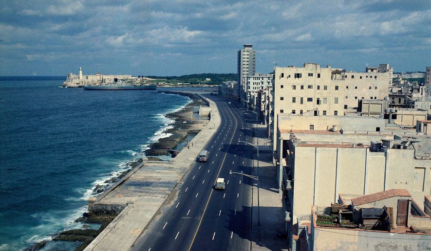 This is a general view of El Malecon in Havana, Cuba, seen Nov. 1971. (AP Photo/Beverley Reed, File)