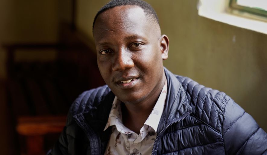 Festus Omwamba sits inside the dock at Kahawa Law Courts in Kiambu on Thursday, Feb. 26, 2026. (AP Photo/Brian Inganga)