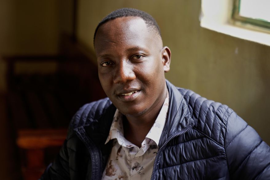 Festus Omwamba sits inside the dock at Kahawa Law Courts in Kiambu on Thursday, Feb. 26, 2026. (AP Photo/Brian Inganga)