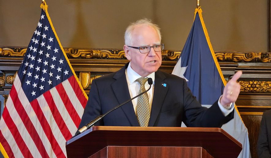 Democratic Minnesota Gov. Tim Walz gives a news conference at the state capitol in St. Paul, Minn., Thursday, Feb. 26, 2026. (AP Photo/Steve Karnowski) ** FILE **