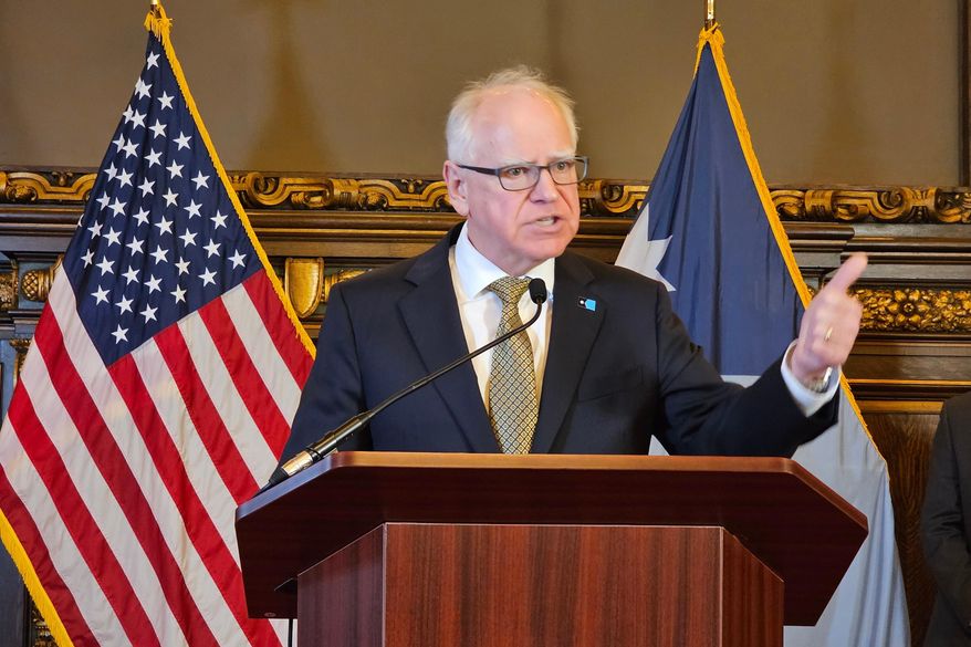 Democratic Minnesota Gov. Tim Walz gives a news conference at the state capitol in St. Paul, Minn., Thursday, Feb. 26, 2026. (AP Photo/Steve Karnowski) ** FILE **
