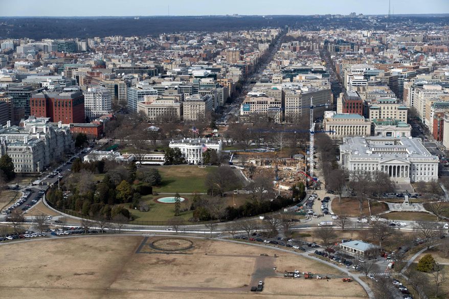 Work continues on the construction of the ballroom at the White House, Tuesday, Feb. 24, 2026, in Washington, where the East Wing once stood. (AP Photo/Jose Luis Magana)