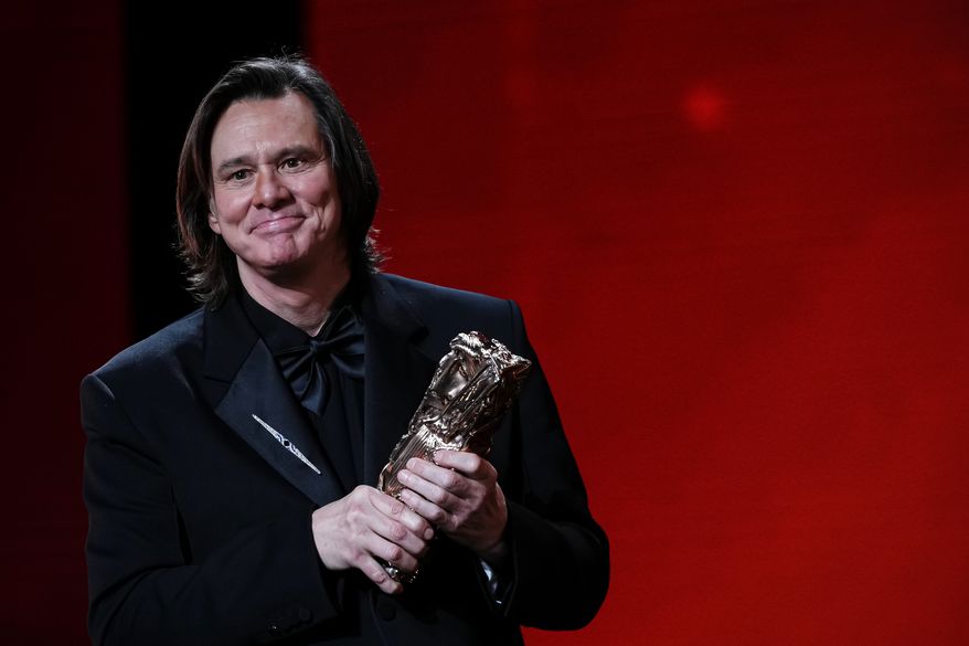 Canadian actor Jim Carrey receives an honorary Cesar Award during the 51st Cesar Awards ceremony, in Paris, Thursday, Feb. 26, 2026. (AP Photo/Aurelien Morissard)