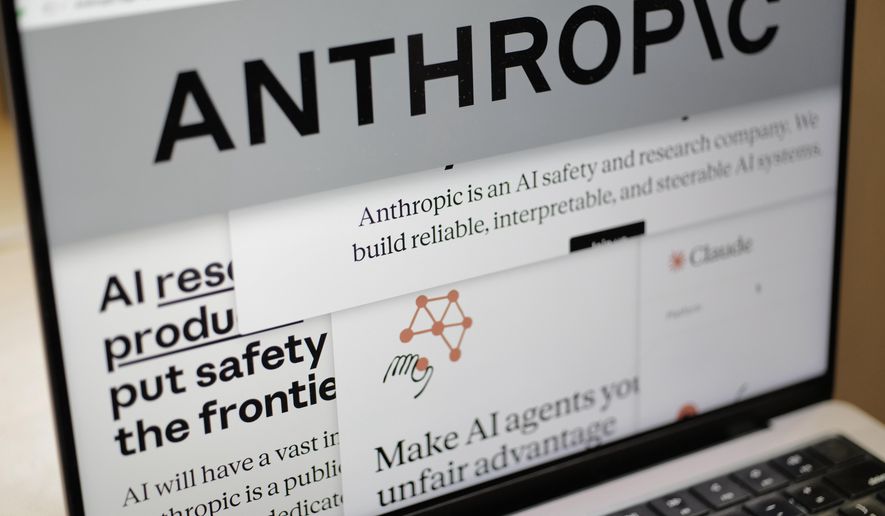 Pages from the Anthropic website and the company's logo are displayed on a computer screen in New York on Thursday, Feb. 26, 2026. (AP Photo/Patrick Sison)