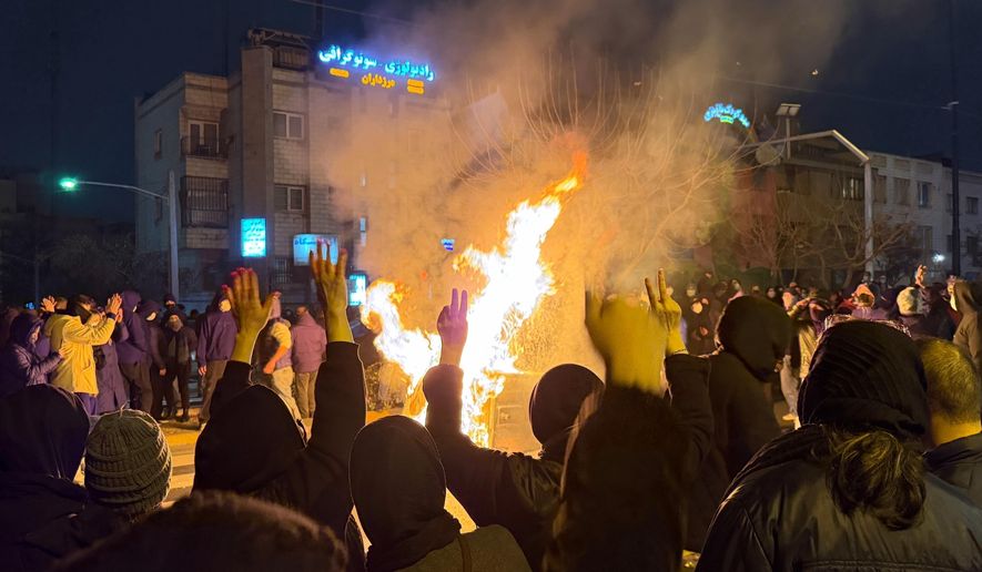 FILE - In this photo obtained by The Associated Press, Iranians attend an anti-government protest in Tehran, Iran, Jan. 9, 2026. (UGC via AP, File)