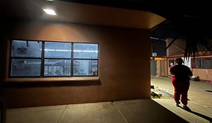 Immigrant families settle in for the night at the Holding Institute in Laredo, Texas, on Feb. 12, 2026. (AP Photo/Valerie Gonzalez)