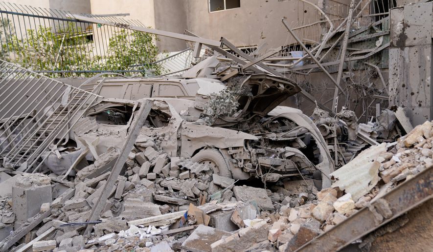 Ruins remain in the aftermath of an Israeli-U.S. strike in Tehran, Iran, Saturday, Feb. 28, 2026. (AP Photo/Amir Kholousi/ISNA)