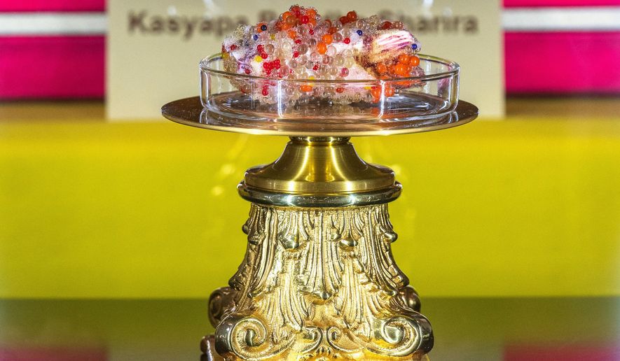 A Buddha's tooth relic is displayed at Wei Mountain Temple, in Rosemead, Calif., Saturday, Feb. 17, 2024. (AP Photo/Damian Dovarganes)