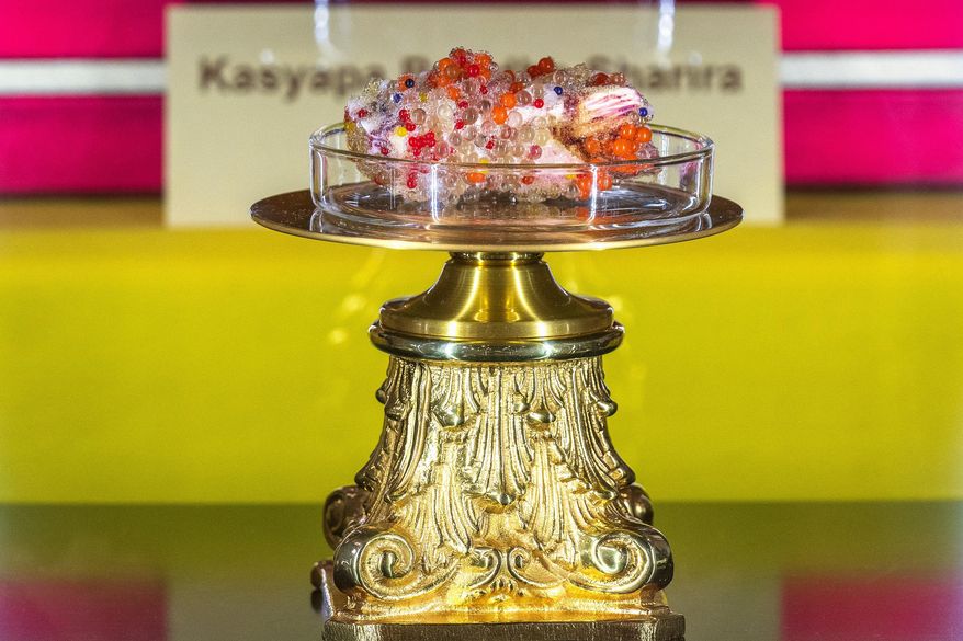 A Buddha's tooth relic is displayed at Wei Mountain Temple, in Rosemead, Calif., Saturday, Feb. 17, 2024. (AP Photo/Damian Dovarganes)