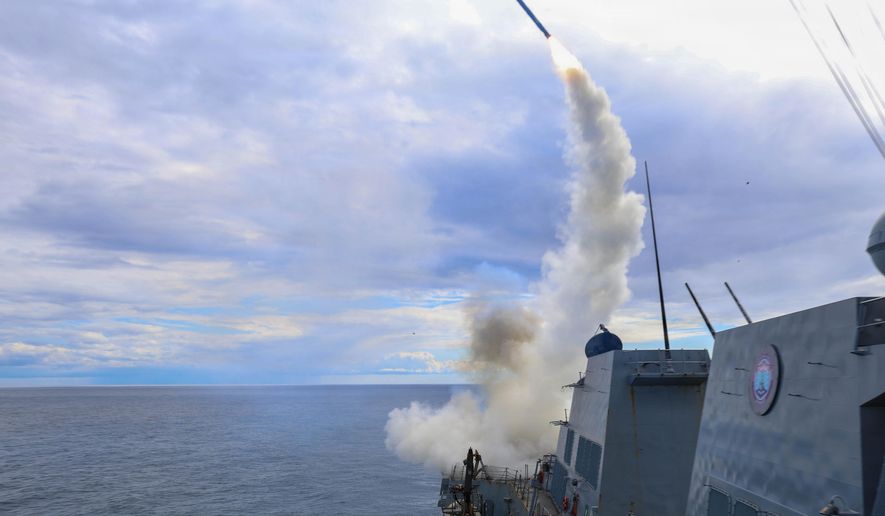 This image provided by U.S. Central Command shows the Arleigh Burke-class guided-missile destroyer USS Thomas Hudner (DDG 116) firing a Tomahawk Land Attack Missile (TLAM) in support of Operation Epic Fury, on Sunday, March 1, 2026. (U.S. Navy via AP)