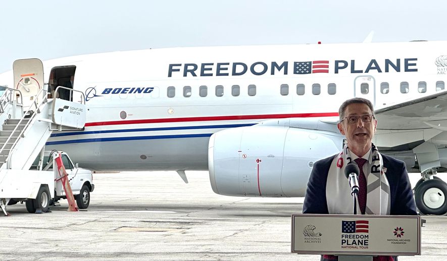 Matthew Naylor, President and CEO of the National WWI Museum and Memorial, speaks to the media after the "Freedom Plane" landed in Kansas City, Mo., Monday, March 2, 2026. (AP Photo/Nick Ingram)