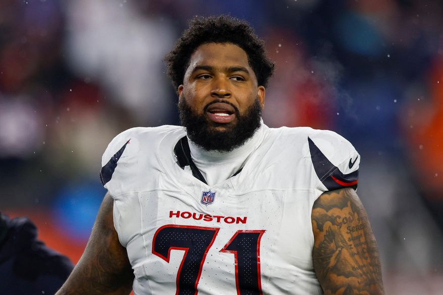 Houston Texans offensive tackle Tytus Howard (71) reacts during the first half of an NFL divisional playoff football game against the New England Patriots, Sunday, Jan. 18, 2026, in Foxborough, Mass. (AP Photo/Greg M. Cooper)