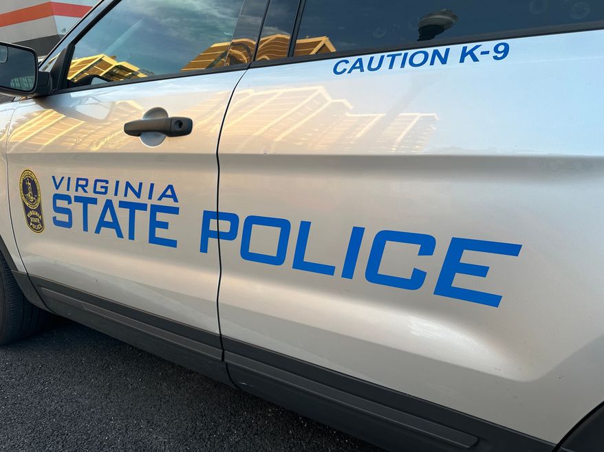 K-9 unit. Sign decal emblem of Virginia State Police Department. File photo credit: DCStockPhotography via Shutterstock.