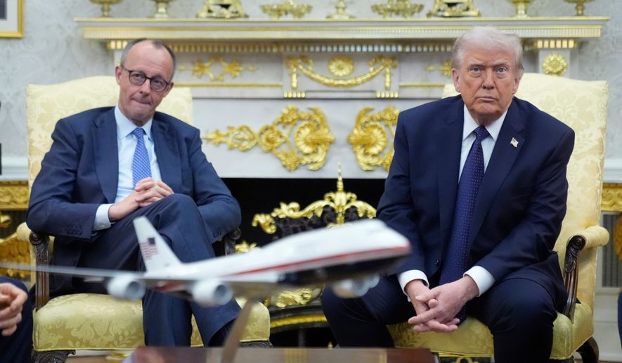 President Donald Trump meets with German Chancellor Friedrich Merz in the Oval Office at the White House, Tuesday, March 3, 2026, in Washington. (AP Photo/Mark Schiefelbein)