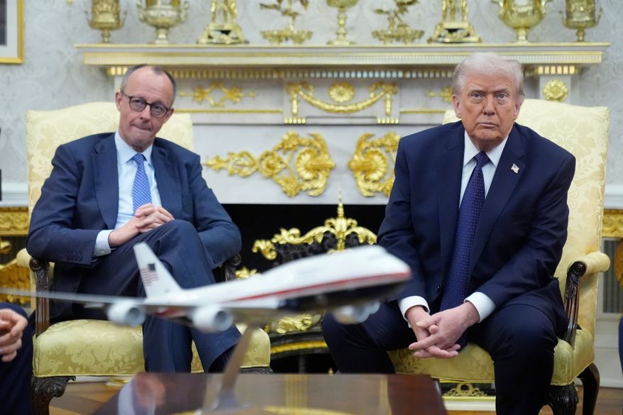President Donald Trump meets with German Chancellor Friedrich Merz in the Oval Office at the White House, Tuesday, March 3, 2026, in Washington. (AP Photo/Mark Schiefelbein)