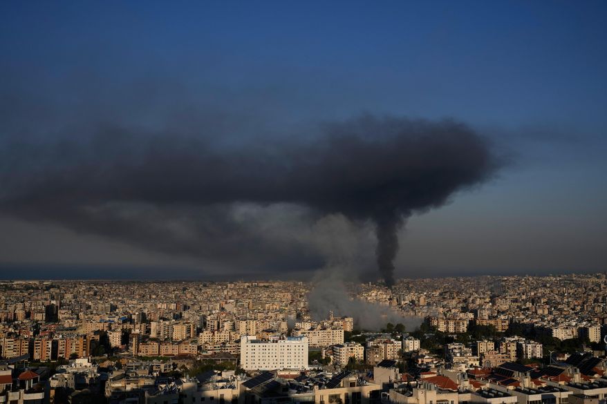 Smoke rises from Israeli airstrikes in Dahiyeh, a southern suburb of Beirut, Lebanon, Tuesday, March 3, 2026. (AP Photo/Hussein Malla)