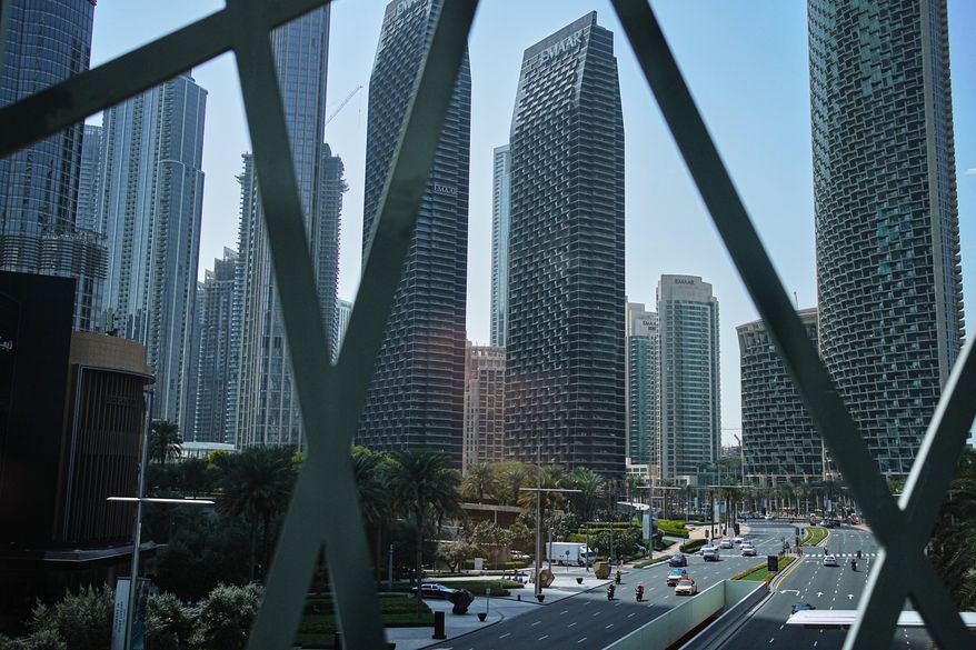 Light traffic moves along a main road in downtown Dubai, United Arab Emirates, Tuesday, March 3, 2026. (AP Photo/ Fatima Shbair)