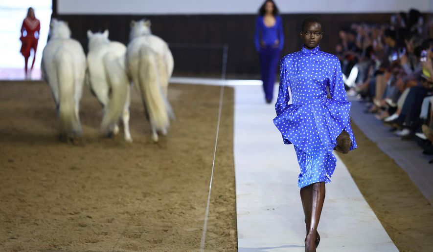 A model wears a creation from the Stella McCartney Fall/Winter 2026-2027 Women's collection presented in Paris, Wednesday, March 4, 2026. (AP Photo/Tom Nicholson)