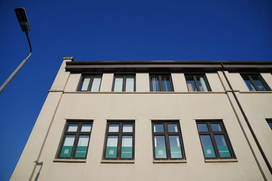 Signage at the constituency office of Joani Reid at Jacobean House in East Kilbride, Scotland, Wednesday, March 4, 2026. (Jane Barlow/PA via AP)