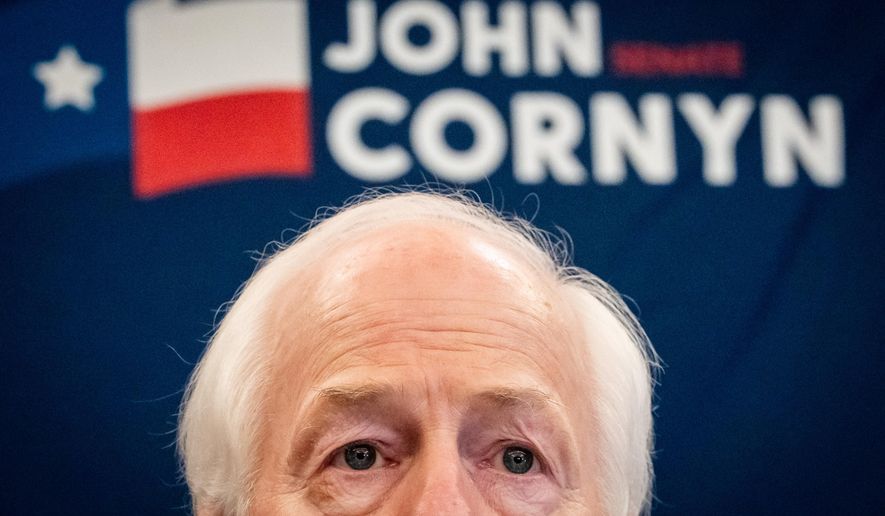 Sen. John Cornyn, R-Texas, speaks to the media Tuesday, March 3, 2026, in Austin. (Sara Diggins/Austin American-Statesman via AP)